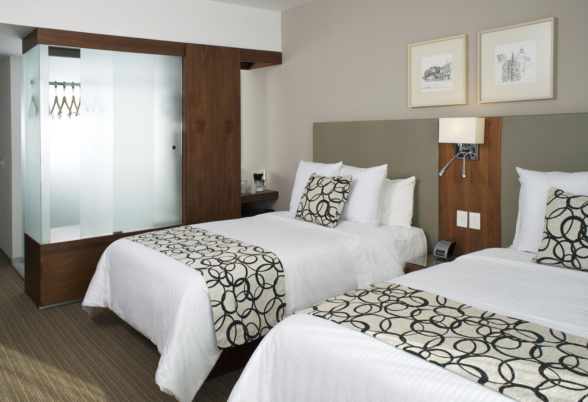Casa Inn Premium Hotel Queretaro Miranda Esterno foto A typical room at the Westin