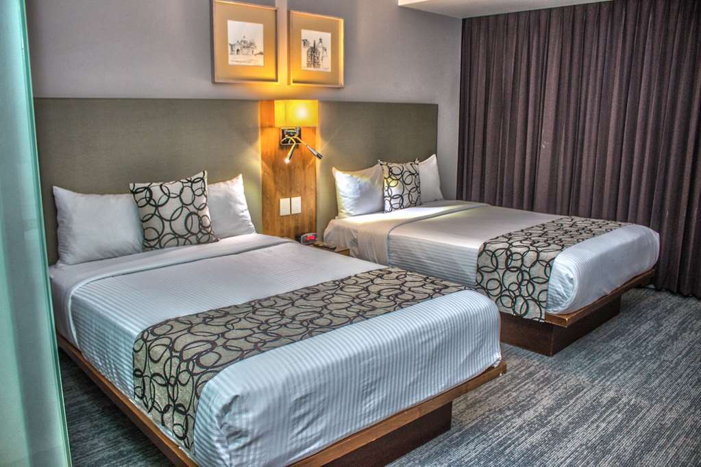 Casa Inn Premium Hotel Queretaro Miranda Camera foto A room at the hotel